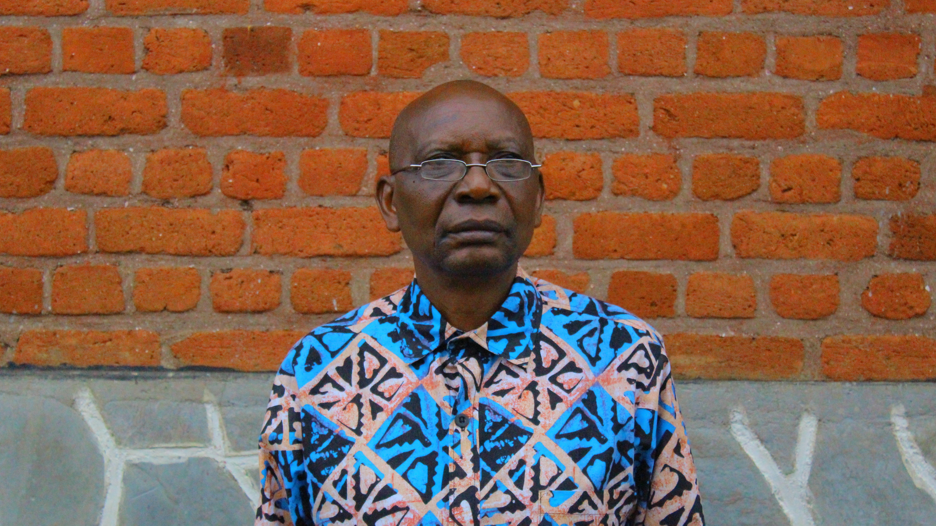 Head Teacher Justin of Kabirizi School