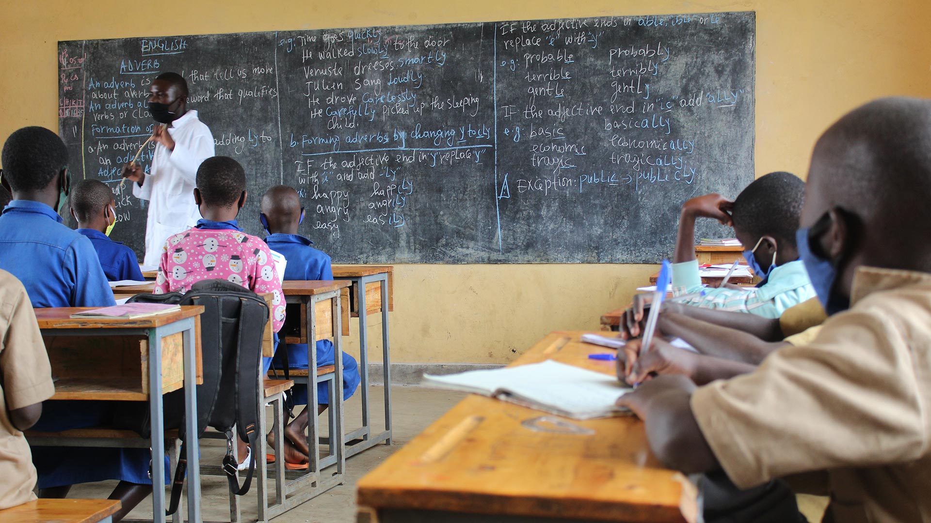 Teacher at Kabirizi instructing students