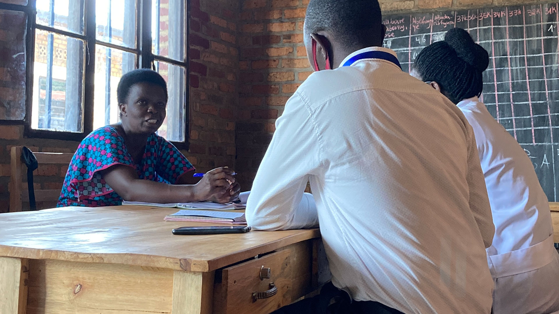 Trainer Marie Jeanne providing Teacher Francine with Constructive Feedback